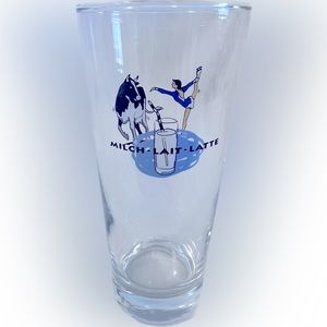 Swiss clear glassware with print of an Figure Skater & Swiss cow.